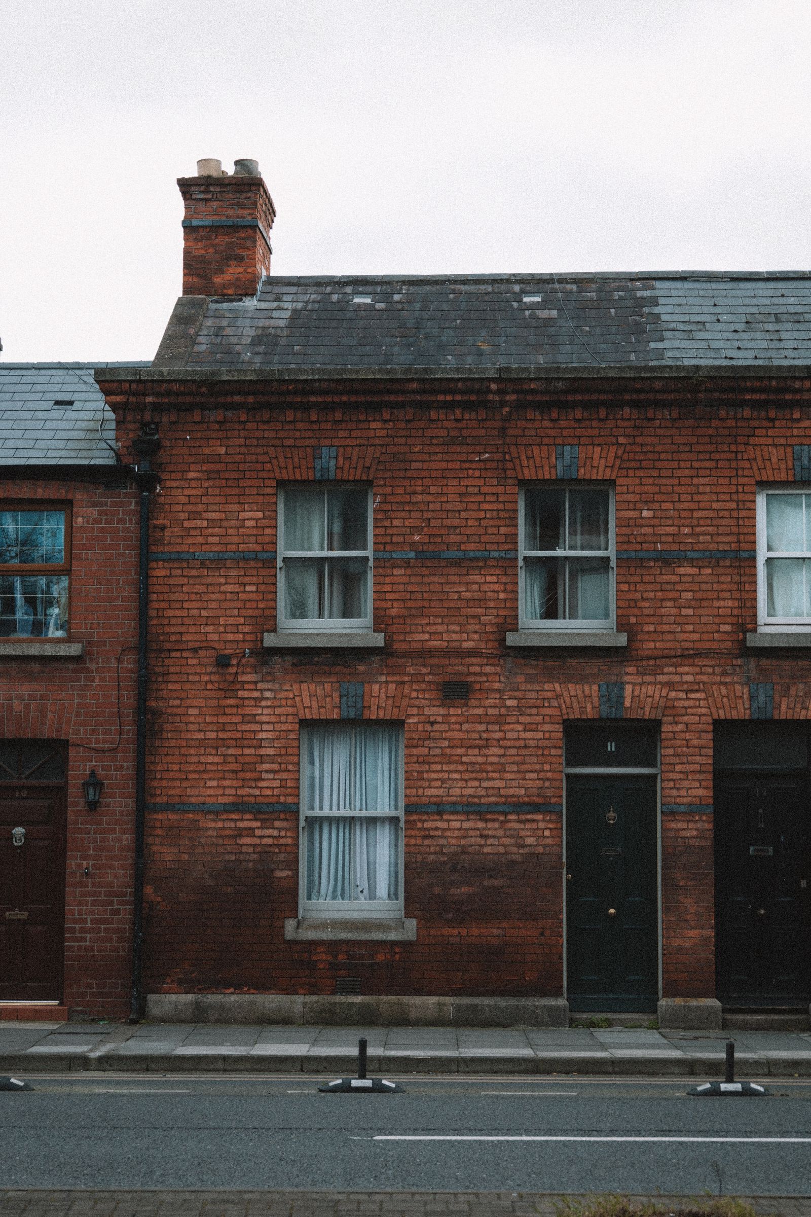 Traditional brick houses on a quiet UK street